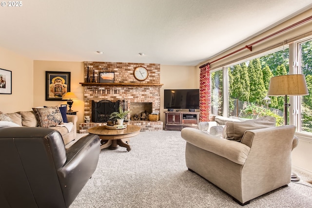 9122 NW Wood Rose Loop, Portland, OR 97229 - carpeted living room with healthy amount of natural light and a fireplace