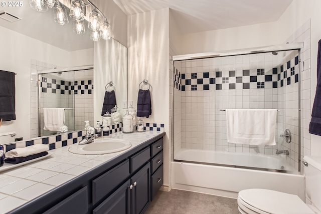 9122 NW Wood Rose Loop, Portland, OR 97229 - bathroom with toilet, vanity, bath / shower combo with glass door, and tile patterned floors