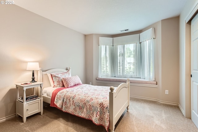 9122 NW Wood Rose Loop, Portland, OR 97229 - bedroom featuring light carpet and baseboards