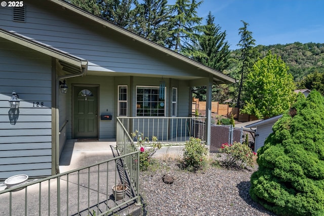128 NW Woodrose Ct, Roseburg, OR 97471 - property entrance with a porch