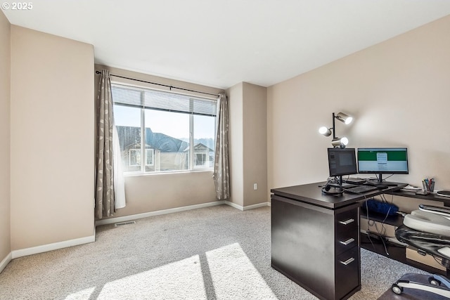 home office with light colored carpet