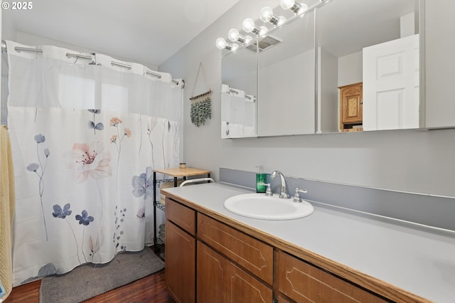 4433 SW 201st Ave, Beaverton, OR 97078 - full bath with wood finished floors, vanity, and a shower with curtain