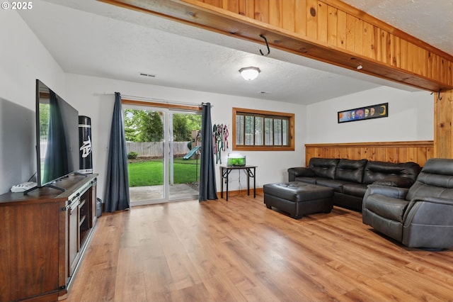 4433 SW 201st Ave, Beaverton, OR 97078 - living area with light wood finished floors and a textured ceiling