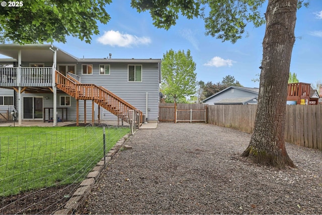 4433 SW 201st Ave, Beaverton, OR 97078 - rear view of property featuring stairs and a wooden deck