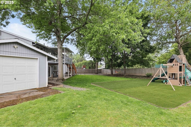 4433 SW 201st Ave, Beaverton, OR 97078 - view of yard featuring stairway, a playground, and a garage
