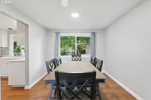 4433 SW 201st Ave, Beaverton, OR 97078 - dining room with wood finished floors, baseboards, and recessed lighting