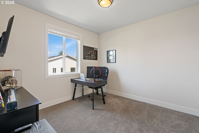 home office featuring carpet floors and baseboards