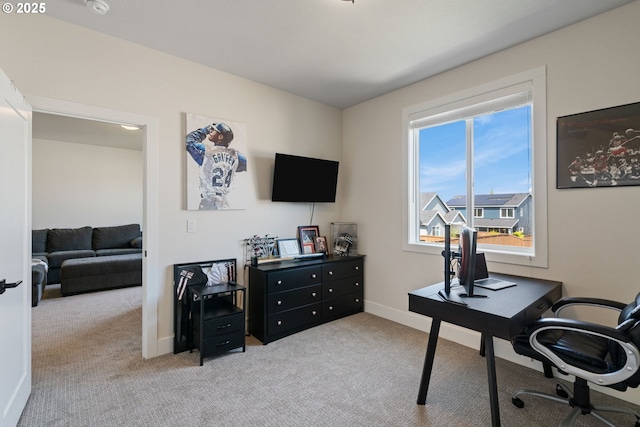 office featuring carpet floors and baseboards