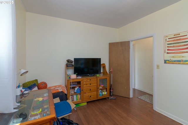 560 N 10th St, Coos Bay, OR 97420 - bedroom featuring wood finished floors and a desk