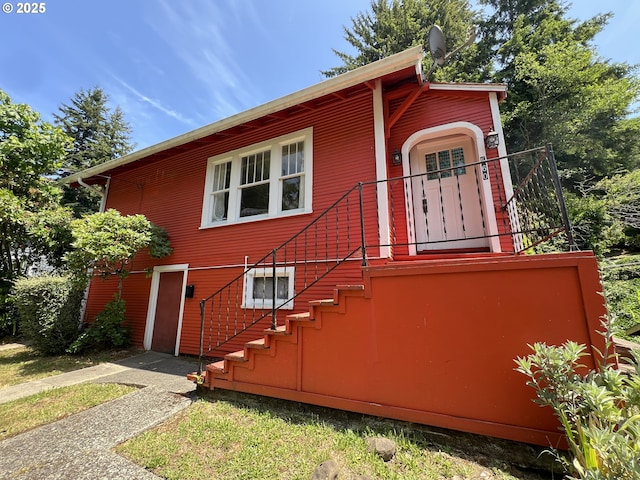 560 N 10th St, Coos Bay, OR 97420 - view of property exterior with stairway