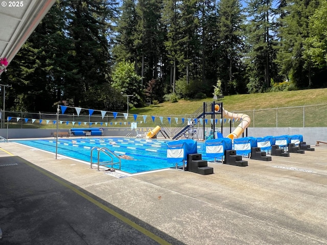 560 N 10th St, Coos Bay, OR 97420 - community pool featuring view of wooded area