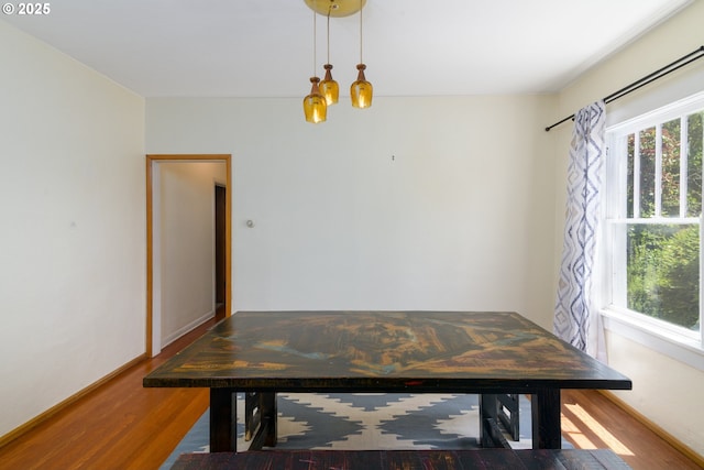 560 N 10th St, Coos Bay, OR 97420 - unfurnished dining area with wood finished floors and a chandelier