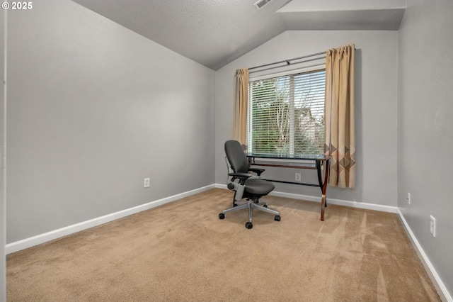 office with light carpet, lofted ceiling, visible vents, and baseboards