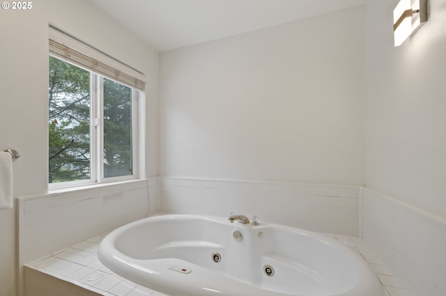 bathroom with a whirlpool tub