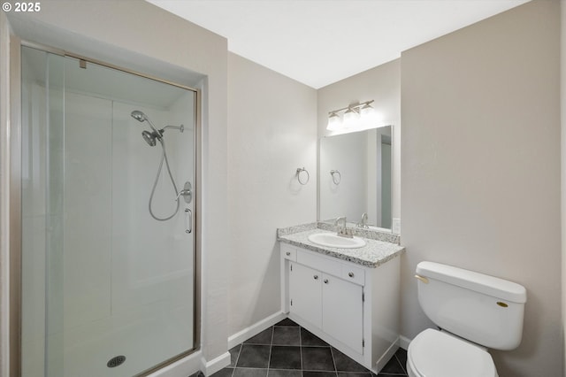 bathroom featuring walk in shower, tile patterned floors, toilet, and vanity