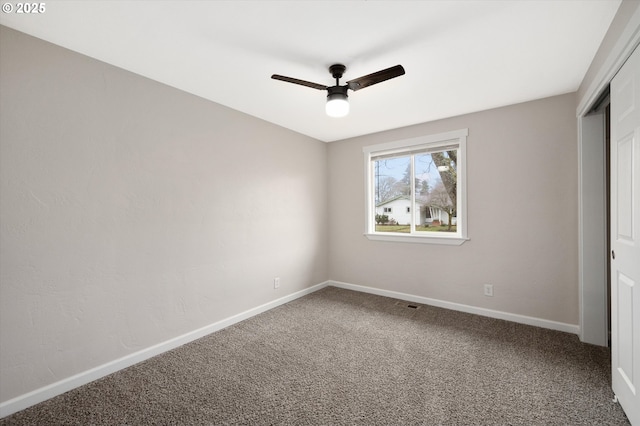 unfurnished bedroom with ceiling fan and carpet flooring