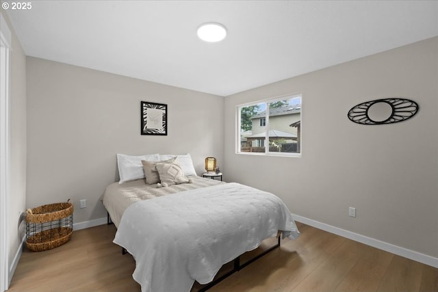 7995 SE Roslyn St, Milwaukie, OR 97222 - bedroom with baseboards and light wood-type flooring