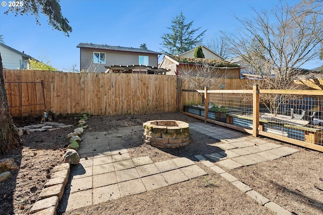 view of patio featuring a fire pit