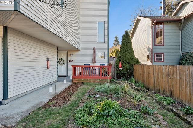 property entrance with a deck