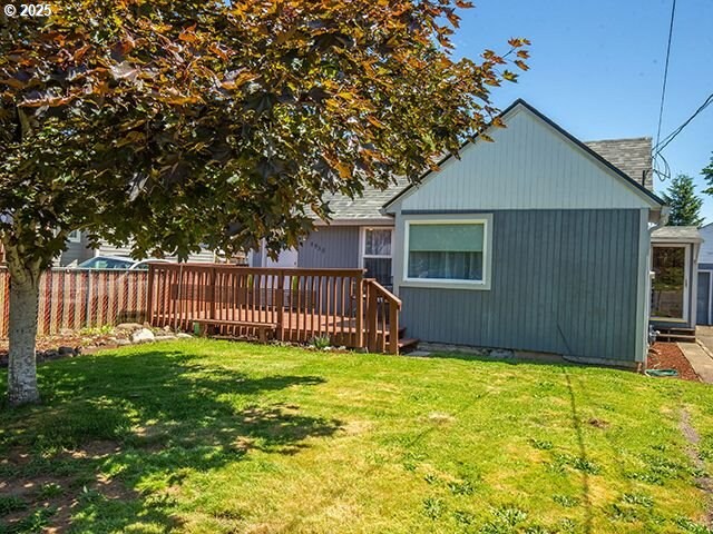 4930 SE 113th Ave, Portland, OR 97266 - rear view of house featuring a wooden deck
