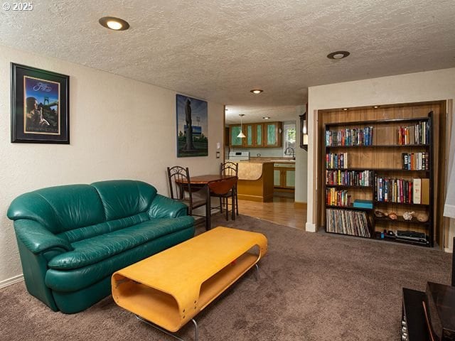 4930 SE 113th Ave, Portland, OR 97266 - carpeted living room with a textured ceiling and recessed lighting