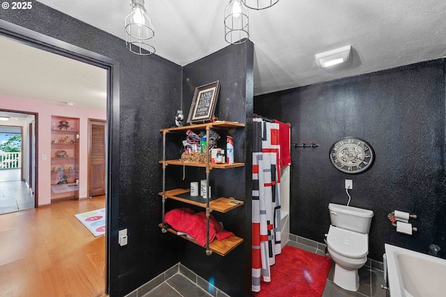 94020 E Shore Dr, North Bend, OR 97459 - full bath featuring toilet, wood finished floors, a sink, and built in features
