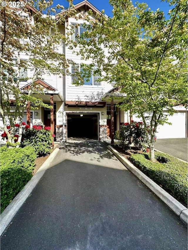 836 NW 118th Ave Unit 104, Portland, OR 97229 - view of community with a residential view and a lawn