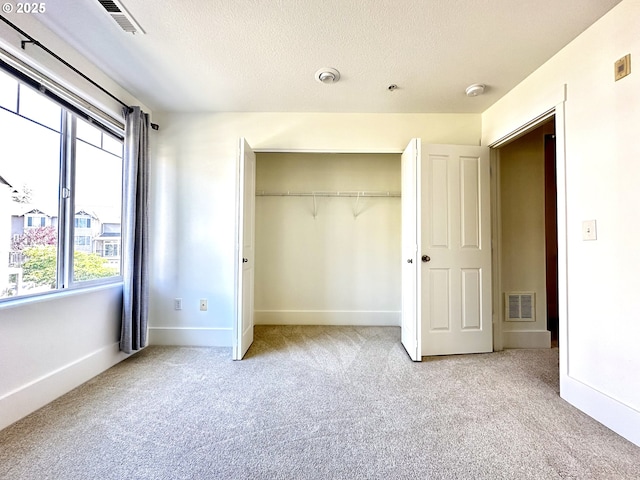 836 NW 118th Ave Unit 104, Portland, OR 97229 - full bath with visible vents, vanity, toilet,  shower combination, and marble finish floor