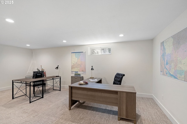 office area with baseboards, recessed lighting, and light colored carpet