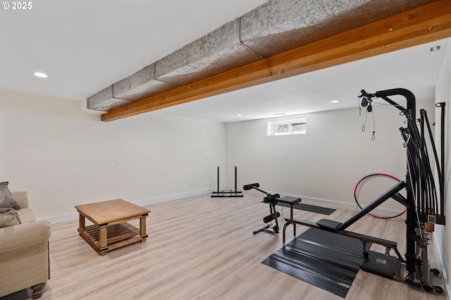 workout area with light wood-type flooring, baseboards, and recessed lighting