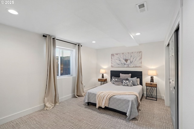 carpeted bedroom featuring baseboards, visible vents, and recessed lighting