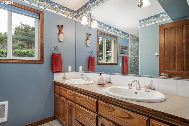 105 NW 45th St Unit 4, Newport, OR 97365 - bathroom with double vanity, tile patterned floors, and a sink