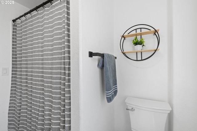 13332 SE Harold St, Portland, OR 97236 - bathroom featuring toilet and a shower with shower curtain