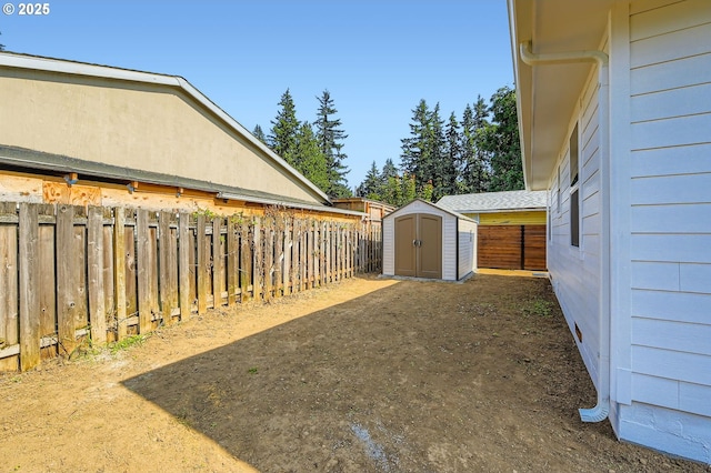 4106 SE 122nd Ave, Portland, OR 97236 - fenced backyard with a storage unit