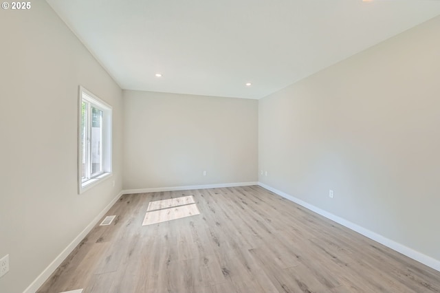 4106 SE 122nd Ave, Portland, OR 97236 - spare room with light wood finished floors and recessed lighting