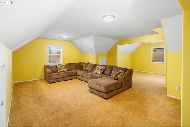 living room featuring vaulted ceiling and light carpet