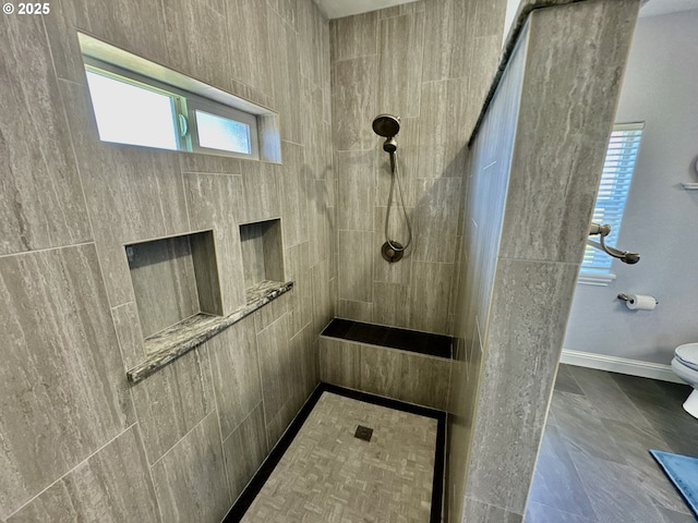842 Chetco Point Ter, Brookings, OR 97415 - bathroom featuring a tile shower and toilet