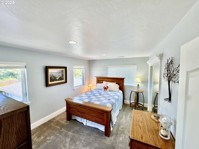842 Chetco Point Ter, Brookings, OR 97415 - bedroom featuring carpet and a textured ceiling