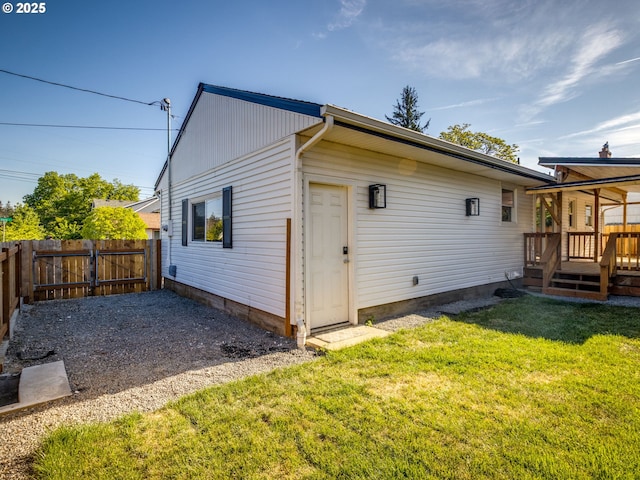 back of property with a wooden deck