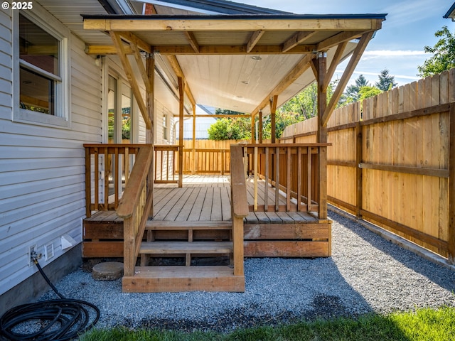 wooden deck featuring fence