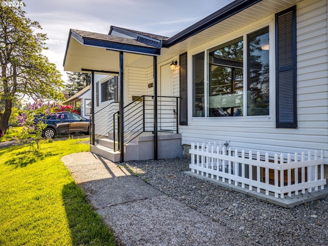 property entrance featuring fence