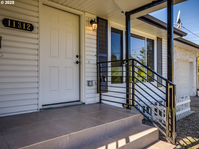 entrance to property with covered porch