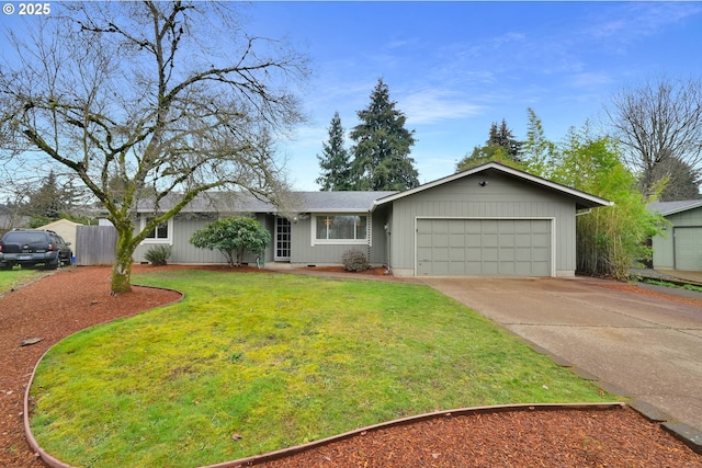 ranch-style house with a garage and a front yard