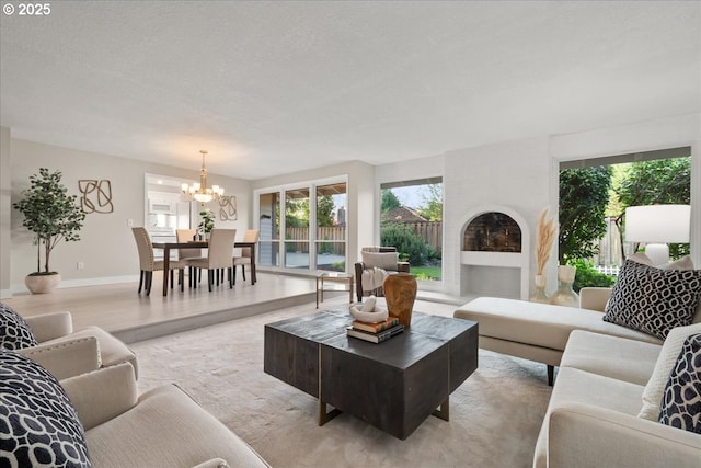 living area featuring a notable chandelier
