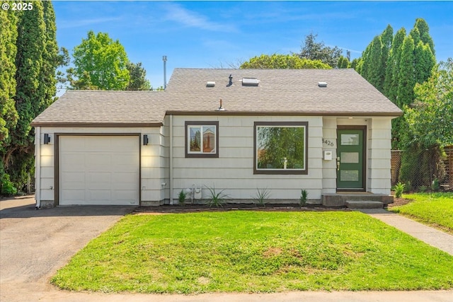 view of front of property with a garage, a shingled roof, driveway, and a front lawn