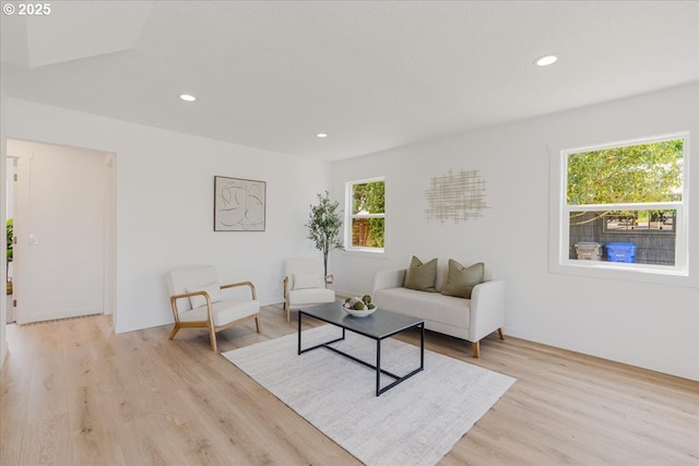 8426 NE Sumner St, Portland, OR 97220 - living room with light wood-style flooring and recessed lighting