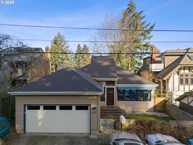 view of front of property with a garage