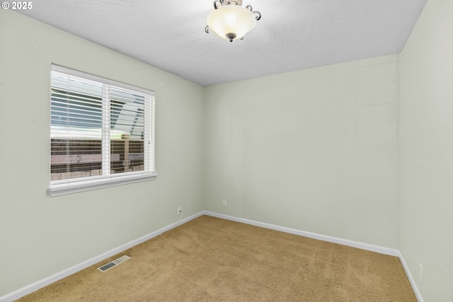 3473 Parker Ln, Springfield, OR 97477 - carpeted empty room featuring baseboards and a textured ceiling