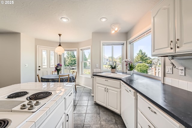 22160 NE Lachenview Ln, Fairview, OR 97024 - kitchen featuring white appliances, a sink, white cabinets, decorative light fixtures, and recessed lighting