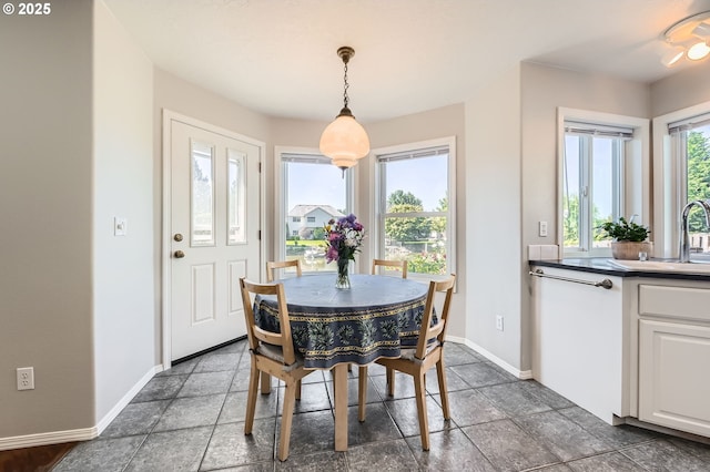 22160 NE Lachenview Ln, Fairview, OR 97024 - dining room featuring baseboards and stone tile floors